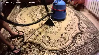 A washing vacuum cleaner, how it works when cleaning garbage, dust, hair from animals.