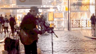 Rob Falsini street performer singing his original song in Covent Garden