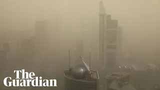 Beijing skies turn yellow as sand and dust engulf Chinese capital