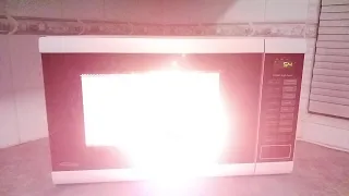 Putting Things Inside a Microwave (While it's Inside)