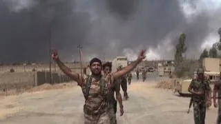 Iraq forces retake key town south of Mosul