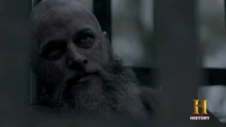 Ragnar Lothbrok talks to the seer while traveling imprisoned