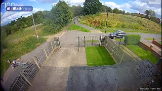 Moment hapless cyclist is poleaxed after hurtling downhill towards a gate and crashing into it #news