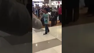 Beyoncé Listen cover   kid in Philippines shopping mall