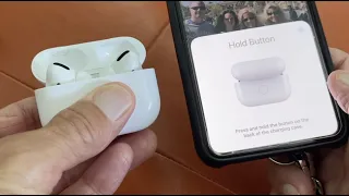 What does the button on the back of my AirPods Pro case do?