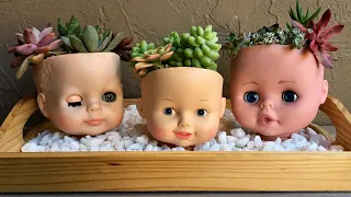 succulent plants // doll head planters // Upcycled Garden Planters