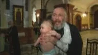 Infants take part in mass baptism