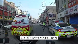 Two police motorcycles and a ambulance / Emergency transport of pedestrian traffic accident patients