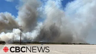 Out-of-control wildfire forces west-central Alberta residents to flee