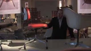 Examining a Herman Miller Eames fiberglass chair of 1972