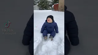 Baby talking in snow