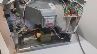 Microwave runs but no heat Part 5 of 6 ( Check voltage from Relay to Transformer )