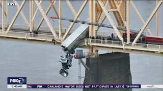 Semi-truck dangles over bridge in Ohio