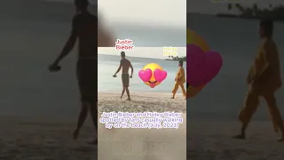 Justin Bieber and Hailey Bieber spotted by a fan walking on the beach