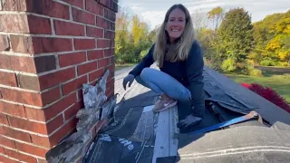 Woman roofs her own house!