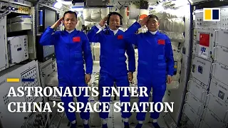 Chinese astronauts explore space station that will be their home for three months