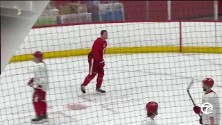 Lucas Raymond and Ben Chiarot fight at Red Wings practice