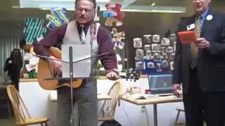 John Gailmor singing at Vermont Arts Council Achievement Day at the Statehouse