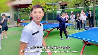 Zhang Jike plays table tennis outdoors with the elderly