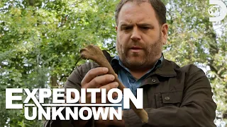 What Does Josh Gates Discover at this Hidden Grave in Poland? | Expedition Unknown | Discovery