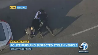 LAPD officers tackle suspect to the ground at end of wild chase through the SFV | ABC7