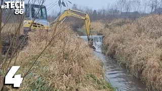 Beaver Dam Removal With Excavator - A Narrow Dam With A Huge Amount Of Water
