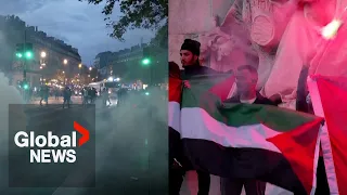France deploys water cannons, tear gas on banned pro-Palestinian rally as Macron urges calm