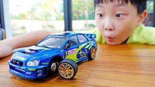 Yejun play with toy cars in a video for kids