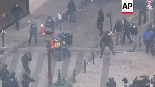 Paris protesters arrested and injured in Champs Elysee