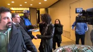 Joe Perry of Aerosmith exits VH1 and signs for a fan whil...