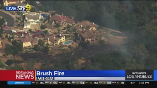 Fire crews stop forward progress of brusher in San Dimas