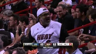 LeBron plays catch with Heat fan in stands!