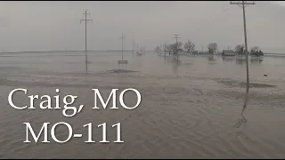 Water Rising Home Underwater Nearly Topping Man-Made levee on MO-111- Craig, MO