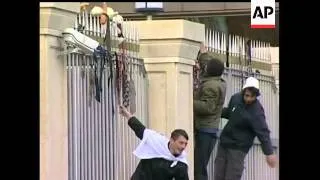 Thousands marched in front of parliament in Georgia demanding the president resign. They hung neckti