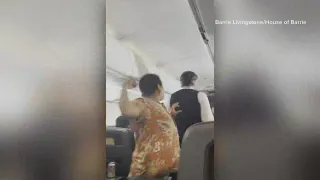 Video shows American Airlines passenger hit flight attendant in the head, union says