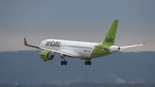 (4K) Air baltic A220 landing at Zurich