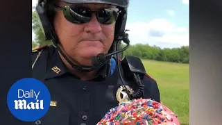 Hilarious cop accepts doughnut as bribe!