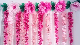 Decoration idea with hanging 🌿paper crepe 🍃 flowers🙂 and plastic tablecloth🍀for any occasion and day