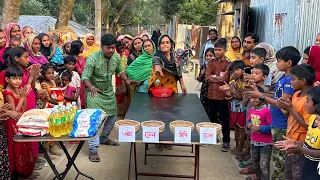 বল ছুড়ে ঝুড়িতে ফেলতে পারলেই চাল, ডাল, তেল, চিনি জেতার সুযোগ। নতুন গ্রামে আপারা মজার খেলায় উপহার জিতল