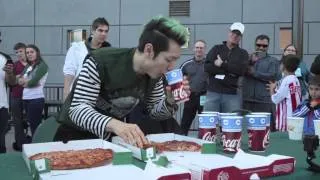 Takeru Kobayashi eats two pizzas in two minutes at PSU football game