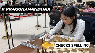 World Champion Ju Wenjun makes sure she writes the correct name of R Praggnanandhaa