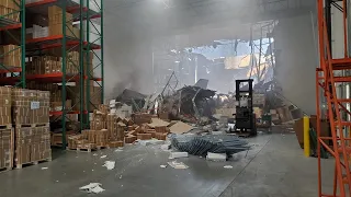 VIDEO: Wreckage inside warehouse where F-16 crashed near March Air Reserve Base | ABC7