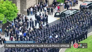 Funeral procession for Euclid police officer Jacob Derbin arrives at St. Columbkille Parish in Parma