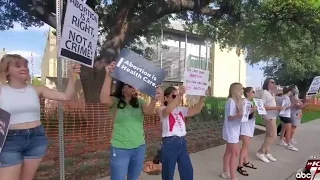 Pro-abortion rights protesters gather outside federal courthouse in Bexar County to demand abort...