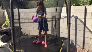 Slow mo water balloons on trampoline