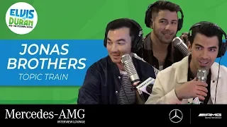 Jonas Brothers Take Over For Elvis Duran With 'Jonas Topic Train’ | Elvis Duran Show