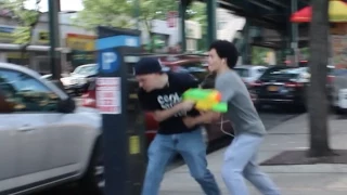 Spraying Water Gun In The Hood PRANK GONE WRONG