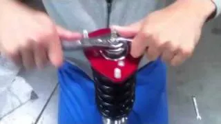 How to properly tighten the top assembly of a coilover