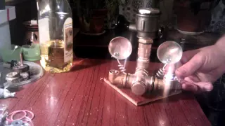 Vegetable oil lamp with two argand burners, filling and turning on