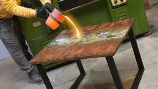 Molten metal table and Bubinga.